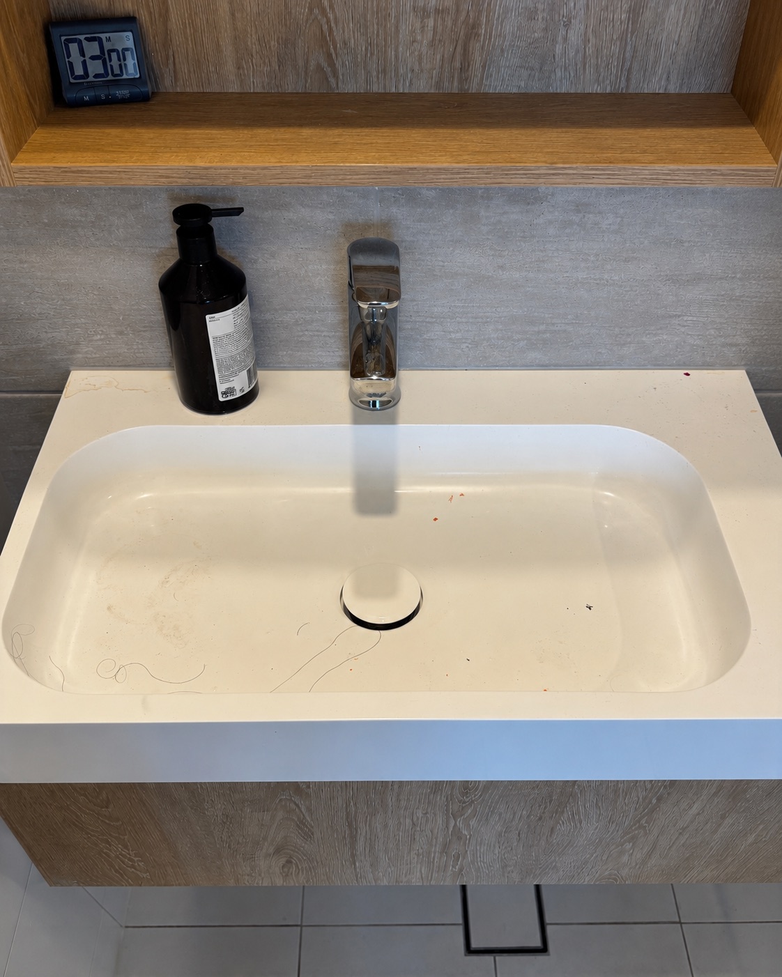Bathroom vanity basin before Lumi Cleaning