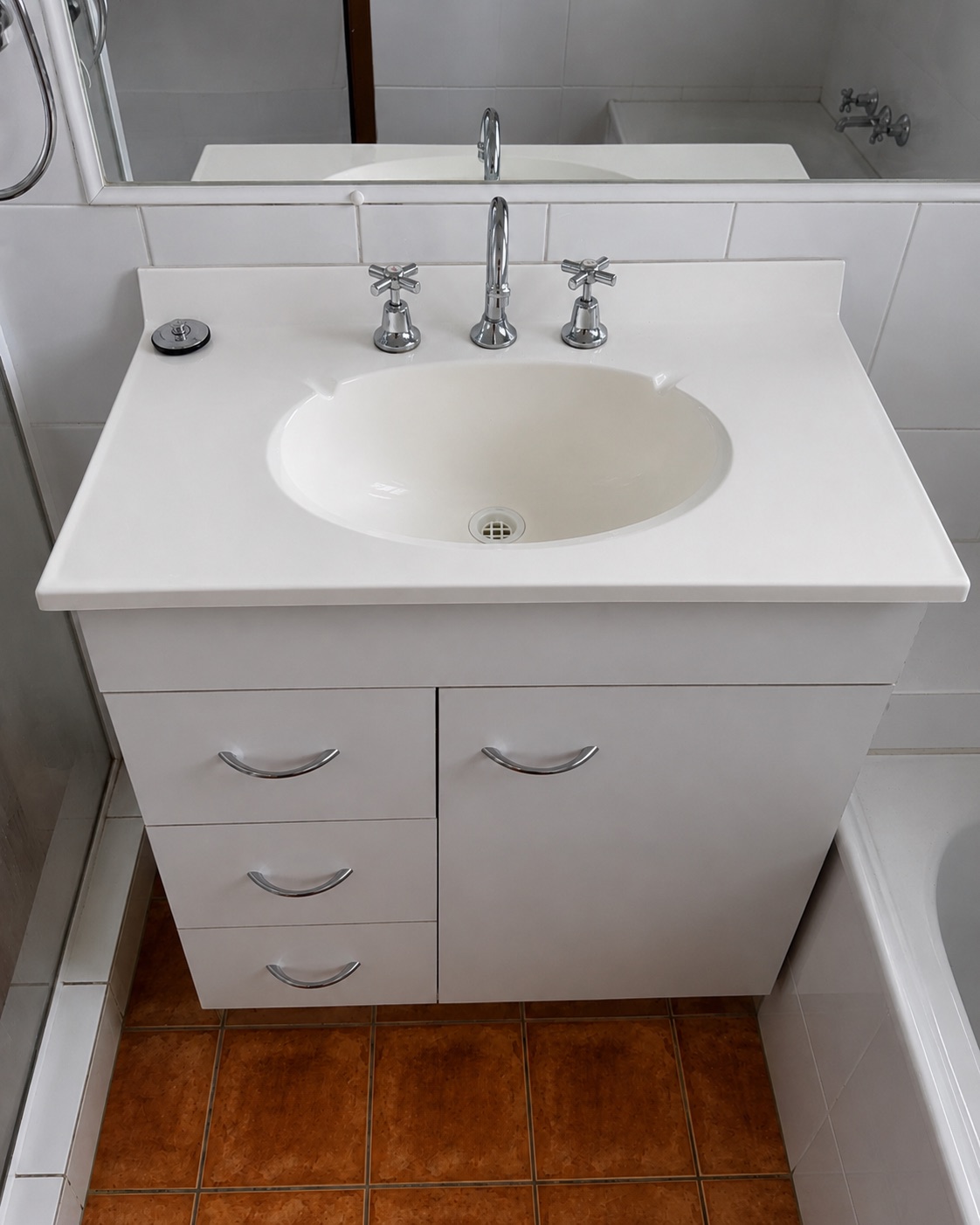 Clean white bathroom vanity after Lumi Cleaning